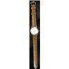 Image 1 : Blancpain, a lady's 18ct gold round wristwatch, circa 1970, no.2393, the white dial with gold Rom...