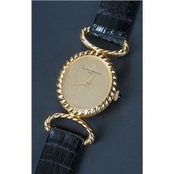 Baume and Mercier, a lady's 18ct gold wristwatch, circa 1970, the champagne dial with dauphine ha...