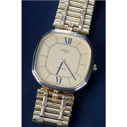 Gerald Genta for Fred, a gentleman's 18ct gold bracelet watch, circa 1970, the champagne dial wit...