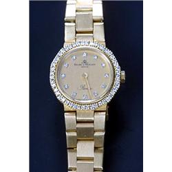 Baume & Mercier, a lady's 18ct gold bracelet watch, ref 1325539 A83249-9, the champagne dial with...