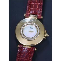 Jaeger-le-Coultre 'Rendezvous', a lady's 18ct gold round wristwatch, the mother-of-pearl dial wit...