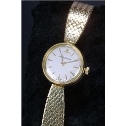 Jaeger-le-Coultre, a lady's 18ct gold bracelet watch, circa 1970, the silvered dial with baton nu...