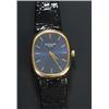 Image 1 : Patek Philippe, a lady's 18ct gold oblong wristwatch, circa 1966, the blued steel effect dial wit...
