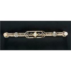 An early 20th century diamond, pearl and cultured pearl bar brooch, the open-work panel with two...