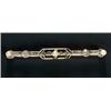Image 1 : An early 20th century diamond, pearl and cultured pearl bar brooch, the open-work panel with two...