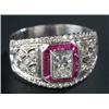 Image 1 : A ruby and diamond dress ring, centred with a rectangular princess-cut diamond approx. 0.58cts, r...