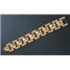 Image 1 : A modern Continental broad bracelet in the form of a central band of canted-rectangular blocks wi...