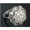 Image 1 : A modern 18ct white gold and diamond 'ballerina' cluster ring, centred with a round brilliant dia...