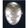 Image 1 : A Continental diamond ring, the ovoid head decorated with a trellis pattern and set with eight ro...