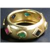 Image 1 : A Continental multi-gem band ring, rub-over set with alternate square and pear-shaped sapphires,...