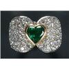 Image 1 : A 9ct gold, emerald and diamond dress ring, centred with a heart-shaped emerald between diamond p...
