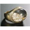 Image 1 : A modern rock crystal and diamond bombe ring, the oval high dome cabochon rock crystal overlaying...