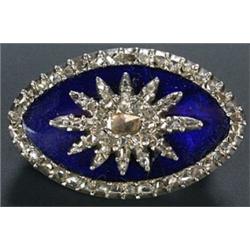 A late 18th century diamond navette shaped panel, adapted as a brooch, centred with a blue glass...