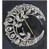 Image 1 : A rose diamond closed-crescent brooch, of open-work foliate design...