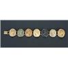 Image 1 : A 19th century lava cameo bracelet, the seven oval vari-coloured panels carved with classical bus...