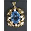 Image 1 : An 18ct gold, cultured pearl and large oval pale blue synthetic spinel pendant, of lobed floral o...