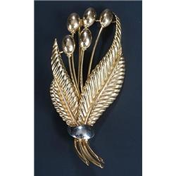 A modern Continental fern leaf and bud spray brooch, stamped '0750'...