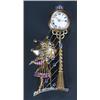 Image 1 : A sapphire and ruby fob watch brooch in the form a girl an a hoop dress holding and umbrella and...