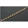 Image 1 : A Theo Fennell 9ct gold fancy link bracelet, of alternate plain oval and reeded twin-crescent lin...