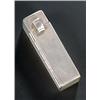 Image 1 : A rectangular engine turned lipstick holder, the cover with a hinged and sprung cover with intern...