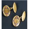 Image 1 : A pair of floral enamelled oval cufflinks, each textured oval link with a central raised diamond-...