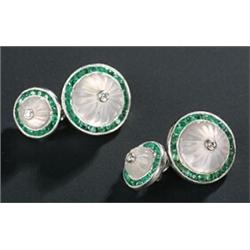 A pair of emerald, rock crystal and diamond cufflinks, each link of two graduated round panels ea...
