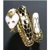 Image 1 : An Italian gold, enamel and diamond 'snake' ring, with black and white enamelled scales and small...