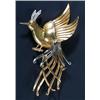 Image 1 : A Continental diamond 'bird of paradise' brooch, in bi-colour metal with a small diamond crown, s...
