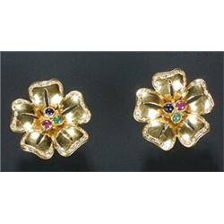 A pair of Continental gem set flower-head earrings, each with a central cabochon ruby, sapphire a...
