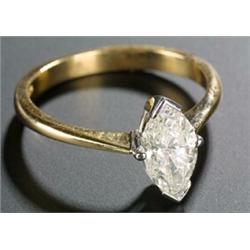 A modern 18ct gold and marquise diamond solitaire ring, the brilliant-cut stone approx. 1.33cts,...