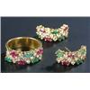 Image 1 : A multi-gem ring and a pair of matching earrings, each in the form of arch with a central scrolli...