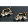 Image 1 : A pair of diamond earrings, each claw set with three graduated old-cut diamonds approx. 0.55cts t...