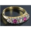 Image 1 : A modern 18ct gold, ruby and diamond five stone scroll-cast half-hoop ring, the three old-cut dia...