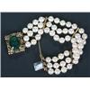 Image 1 : A cultured pearl three row bracelet on green tourmaline clasp, the uniform breads approx. 6.5mm d...