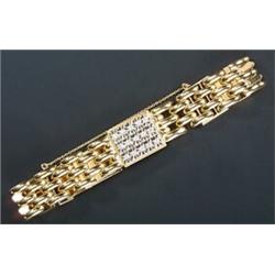 A modern 18ct gold and diamond bracelet, the front designed as a rectangular panel illusion-set w...