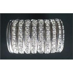 An Italian diamond broad hoop ring, in the form of articulated white batons part set with small r...
