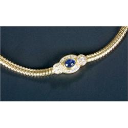 A modern Continental sapphire and diamond necklace, the front designed as a shaped oval panel cen...