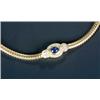 Image 1 : A modern Continental sapphire and diamond necklace, the front designed as a shaped oval panel cen...