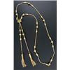 Image 1 : A modern 18ct gold tassel necklace, designed as satinised oval and round beads with rope-work int...