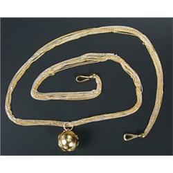 A bi-colour multi-strand necklace and a diamond set spherical pendant, the trace link necklace in...