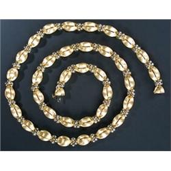 A modern Italian 18ct gold fancy link necklace, in the form of satinised openwork lobed-oval bead...