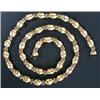 Image 1 : A modern Italian 18ct gold fancy link necklace, in the form of satinised openwork lobed-oval bead...