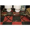 Image 1 : #4 SHOWHOME METAL AND GLASS COFFEE TABLE