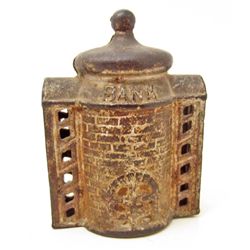 ANTIQUE CAST IRON BUILDING COIN BANK