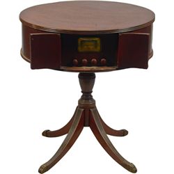 Silvertone Round Table 4-Dial AM Radio.
