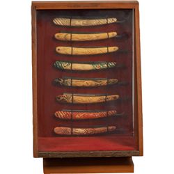 Collection of 8 Early Nude Carved Straight Razors.