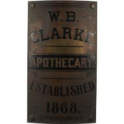 W.B. Clarke Apothecary Brass Metal Store Sign.