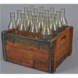 Lot Of 16 1-Quart Glass Oil Bottles In Wood Crate.