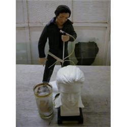 AN ASHTON DRAKE DOLL MODELLED AS ELVIS T 
