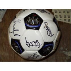 NUFC FOOTBALL SIGNED BY THE TEAM. 